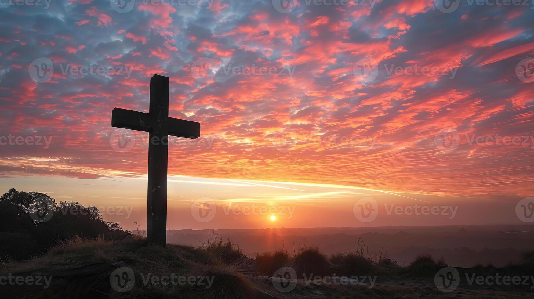 Ample room for text beside an image of a cross-shaped silhouette against a sunset sky photo