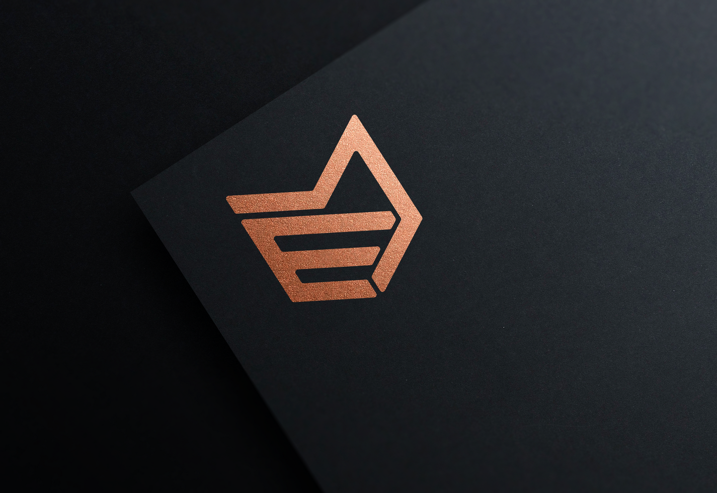 Bronze Foil Logo Mockup on Black Paper psd