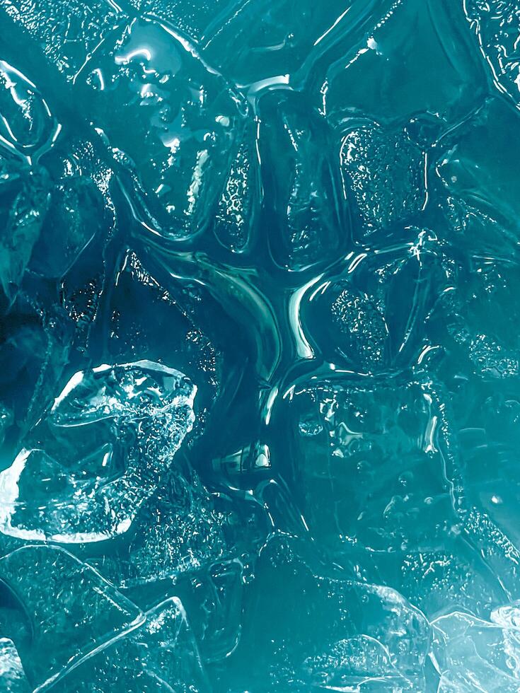 icecubes background,icecubes texture,icecubes wallpaper,ice helps to feel refreshed and cool water from the icecubes helps the water refresh your life and feel good.ice drinks for refreshment business photo