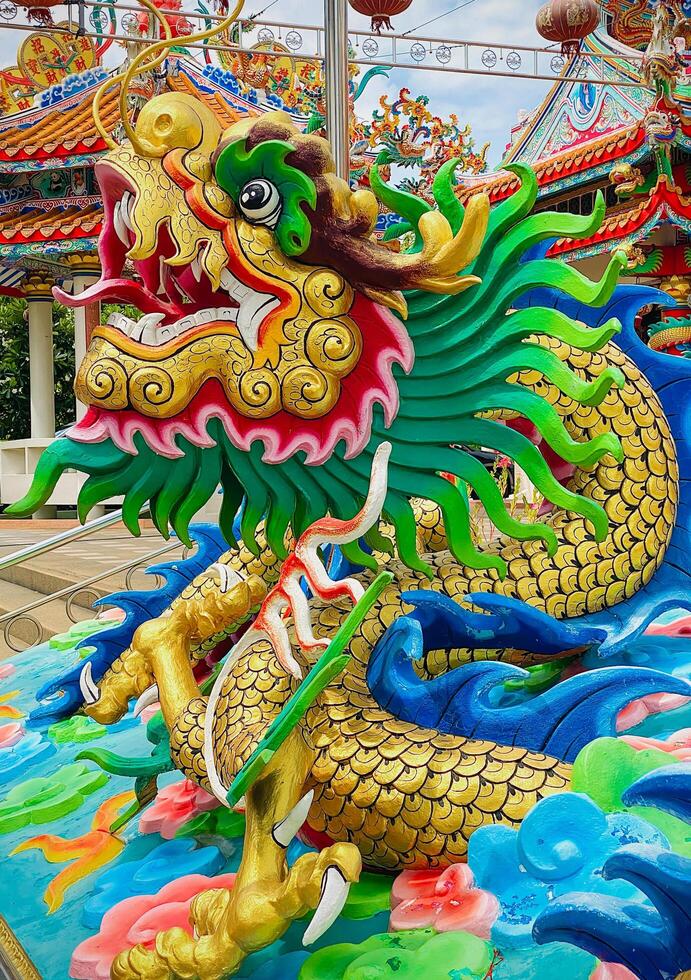 Dragon statue, dragon symbol, dragon Chinese, is a beautiful Thai and Chinese architecture of shrine, temple. A symbol of good luck and prosperity during the Chinese New Year celebrations. photo