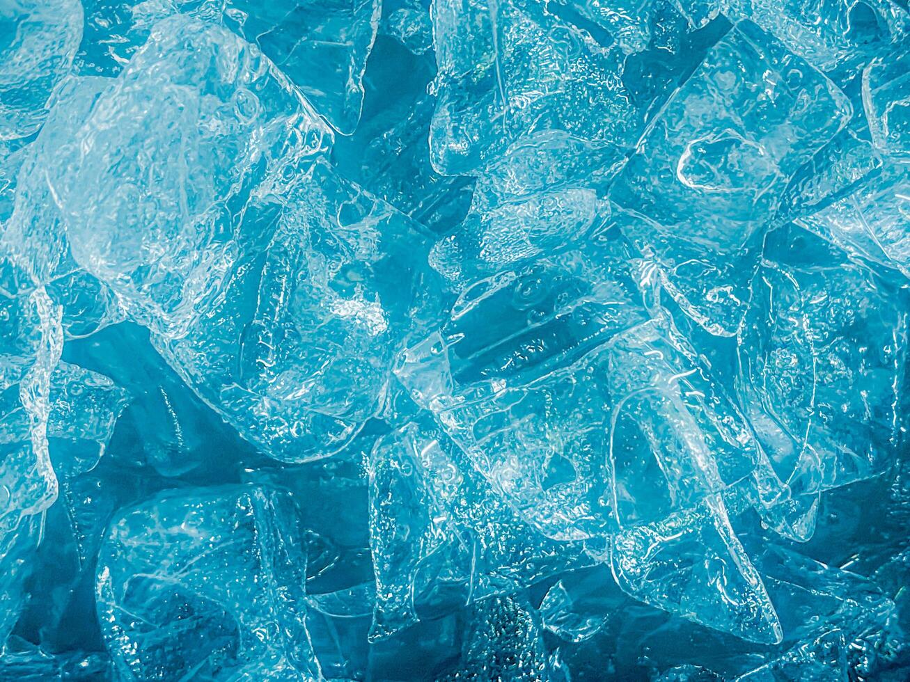 icecubes background,icecubes texture,icecubes wallpaper,ice helps to feel refreshed and cool water from the icecubes helps the water refresh your life and feel good.ice drinks for refreshment business photo