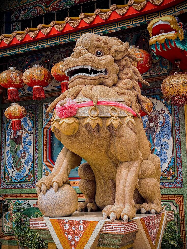 Pixiu or Pi Yao statue, pixiu symbol, pixiu Chinese, is a beautiful Thai and Chinese architecture of shrine, temple. A symbol of good luck and prosperity during the Chinese New Year celebrations. photo