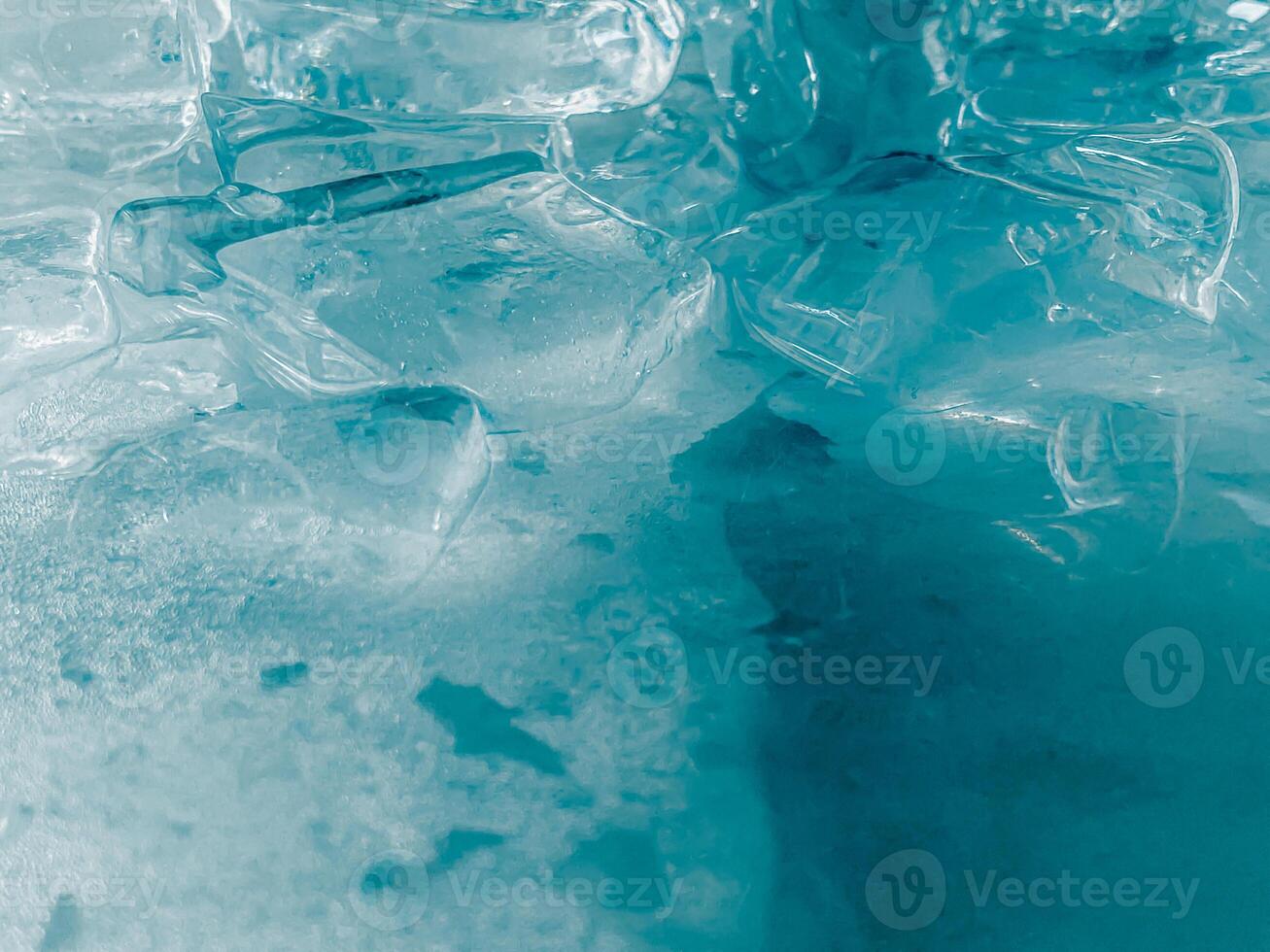 icecubes background,icecubes texture,icecubes wallpaper,ice helps to feel refreshed and cool water from the icecubes helps the water refresh your life and feel good.ice drinks for refreshment business photo