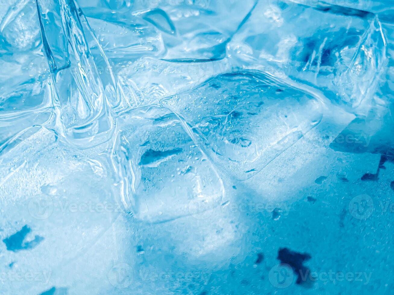 icecubes background,icecubes texture,icecubes wallpaper,ice helps to feel refreshed and cool water from the icecubes helps the water refresh your life and feel good.ice drinks for refreshment business photo