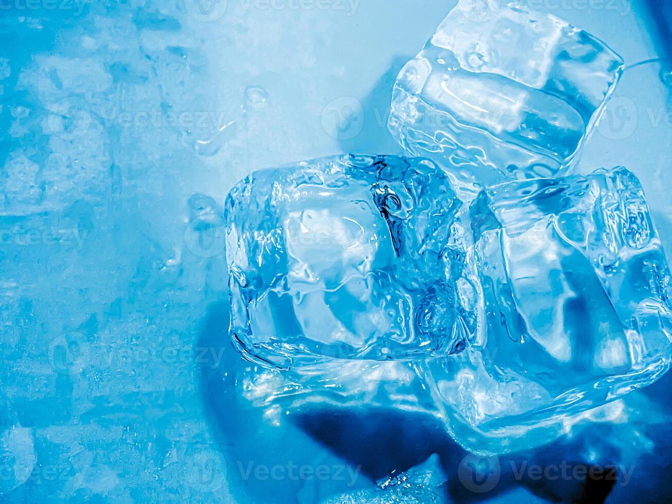 icecubes background,icecubes texture,icecubes wallpaper,ice helps to feel refreshed and cool water from the icecubes helps the water refresh your life and feel good.ice drinks for refreshment business photo