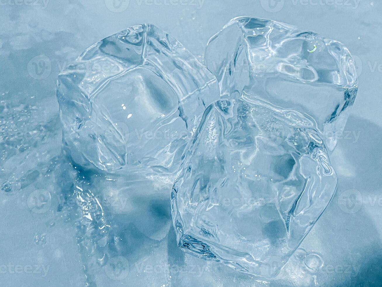 icecubes background,icecubes texture,icecubes wallpaper,ice helps to feel refreshed and cool water from the icecubes helps the water refresh your life and feel good.ice drinks for refreshment business photo