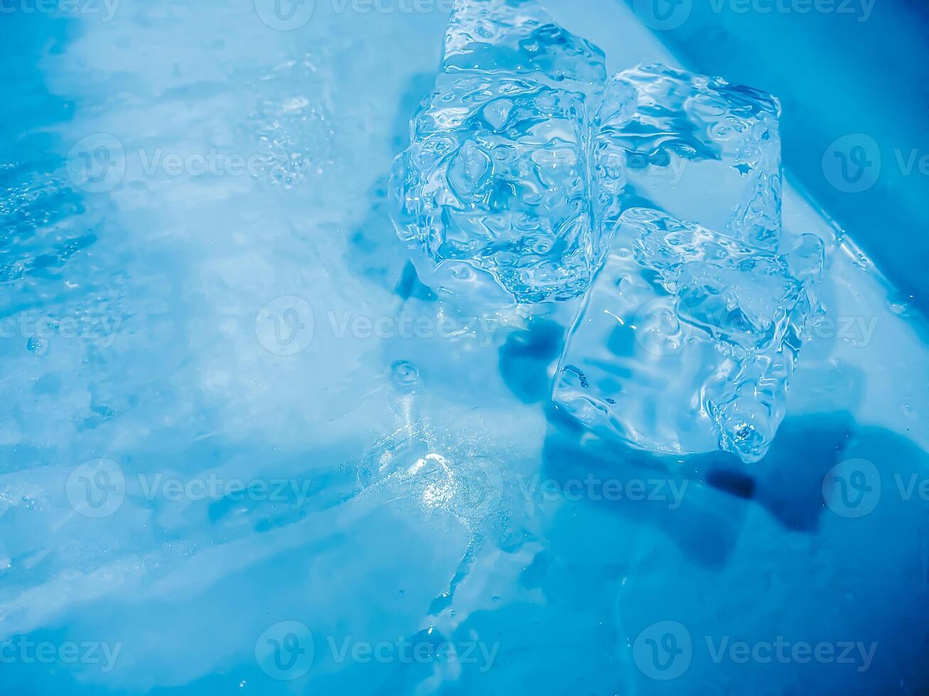 icecubes background,icecubes texture,icecubes wallpaper,ice helps to feel refreshed and cool water from the icecubes helps the water refresh your life and feel good.ice drinks for refreshment business photo
