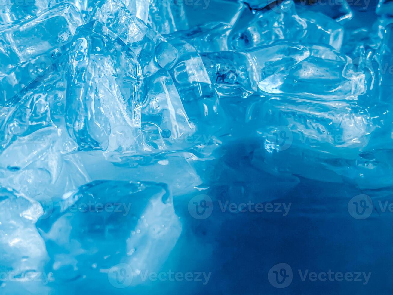 icecubes background,icecubes texture,icecubes wallpaper,ice helps to feel refreshed and cool water from the icecubes helps the water refresh your life and feel good.ice drinks for refreshment business photo