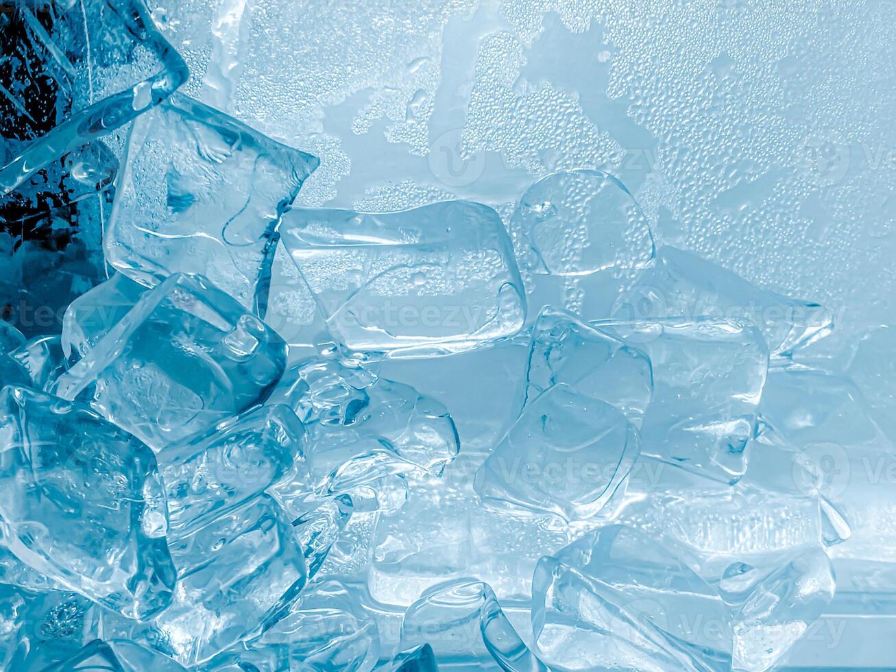 icecubes background,icecubes texture,icecubes wallpaper,ice helps to feel refreshed and cool water from the icecubes helps the water refresh your life and feel good.ice drinks for refreshment business photo