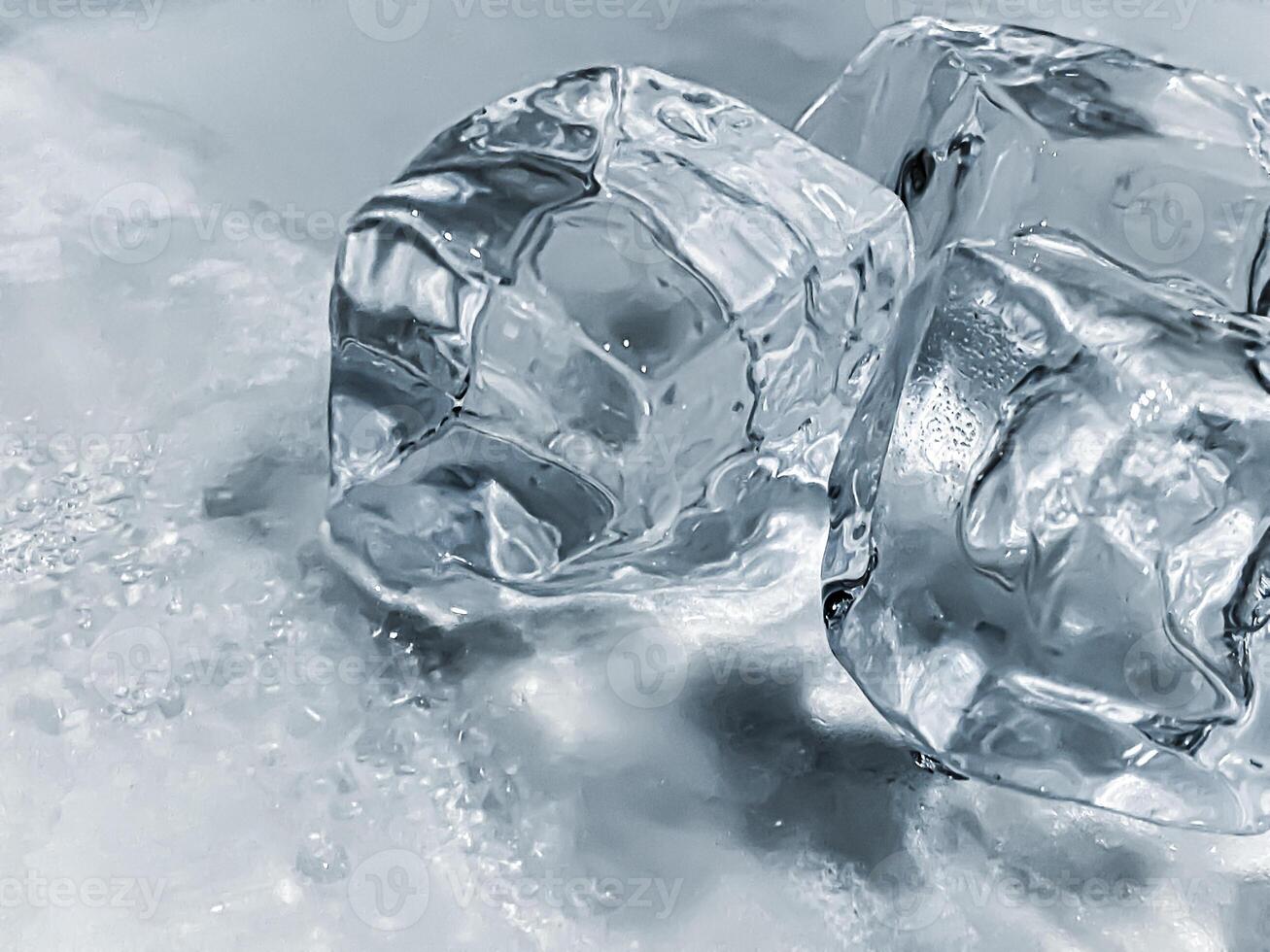 icecubes background,icecubes texture,icecubes wallpaper,ice helps to feel refreshed and cool water from the icecubes helps the water refresh your life and feel good.ice drinks for refreshment business photo