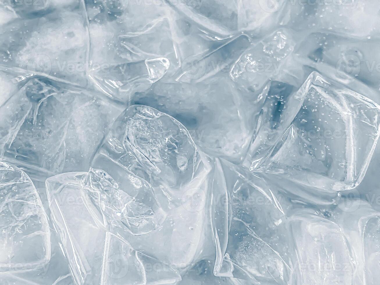 icecubes background,icecubes texture,icecubes wallpaper,ice helps to feel refreshed and cool water from the icecubes helps the water refresh your life and feel good.ice drinks for refreshment business photo