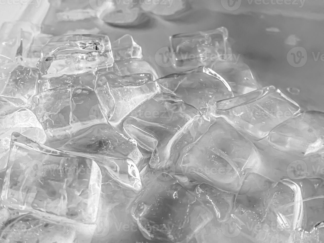 icecubes background,icecubes texture,icecubes wallpaper,ice helps to feel refreshed and cool water from the icecubes helps the water refresh your life and feel good.ice drinks for refreshment business photo