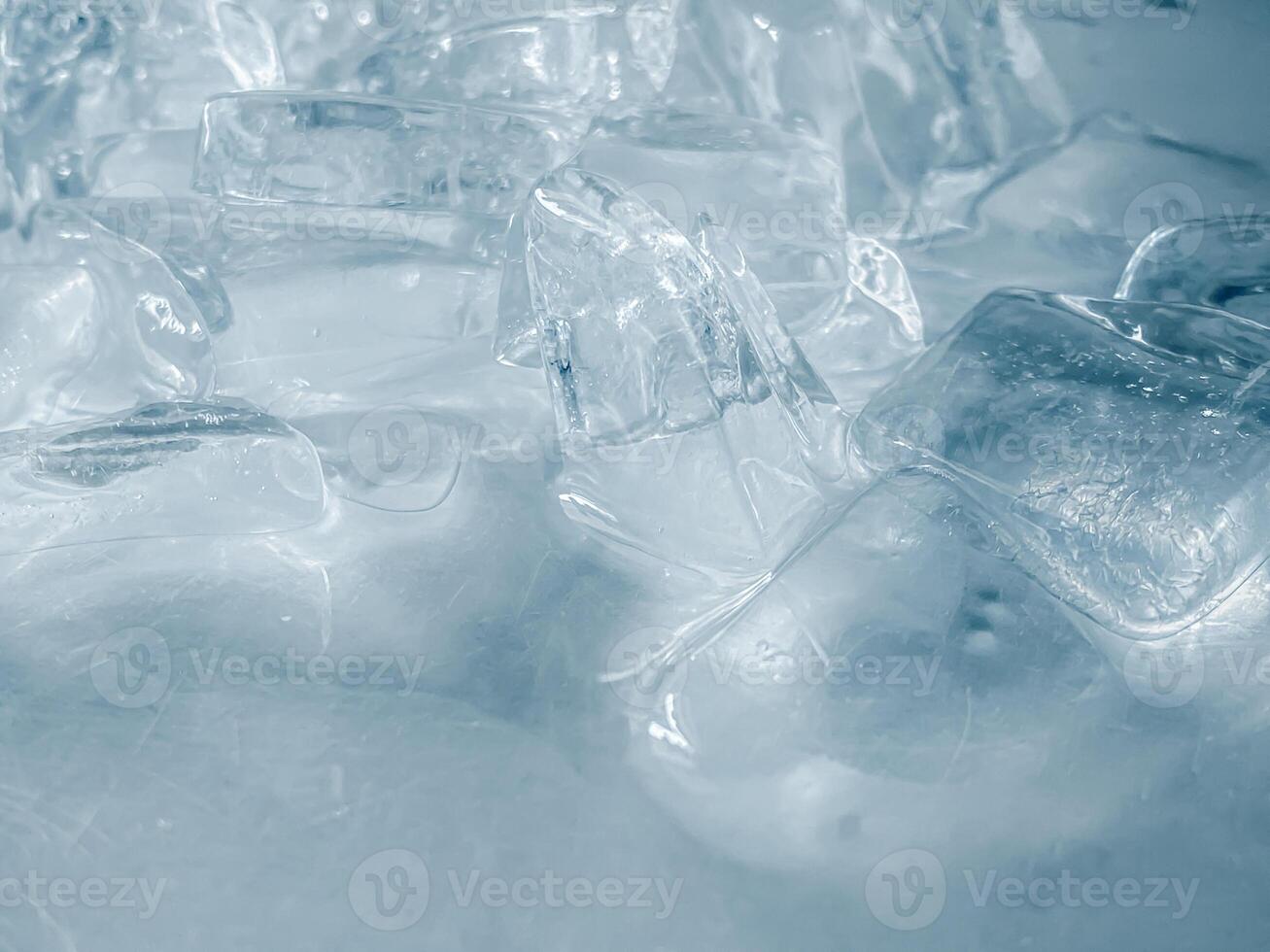 icecubes background,icecubes texture,icecubes wallpaper,ice helps to feel refreshed and cool water from the icecubes helps the water refresh your life and feel good.ice drinks for refreshment business photo