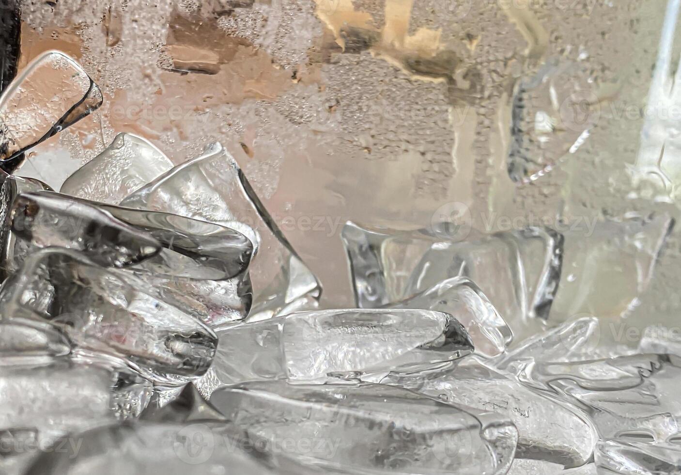 icecubes background,icecubes texture,icecubes wallpaper,ice helps to feel refreshed and cool water from the icecubes helps the water refresh your life and feel good.ice drinks for refreshment business photo