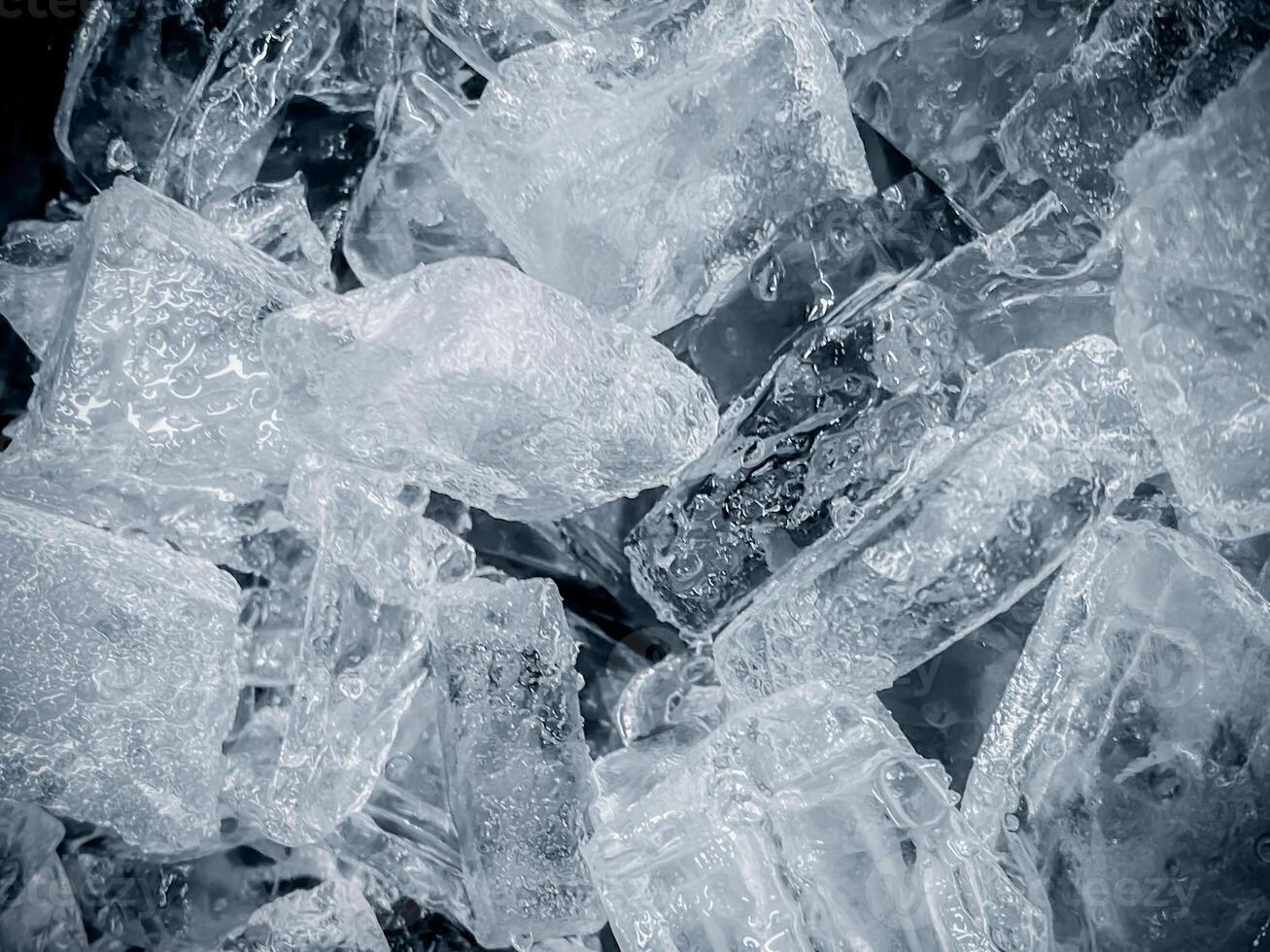 icecubes background,icecubes texture,icecubes wallpaper,ice helps to feel refreshed and cool water from the icecubes helps the water refresh your life and feel good.ice drinks for refreshment business photo