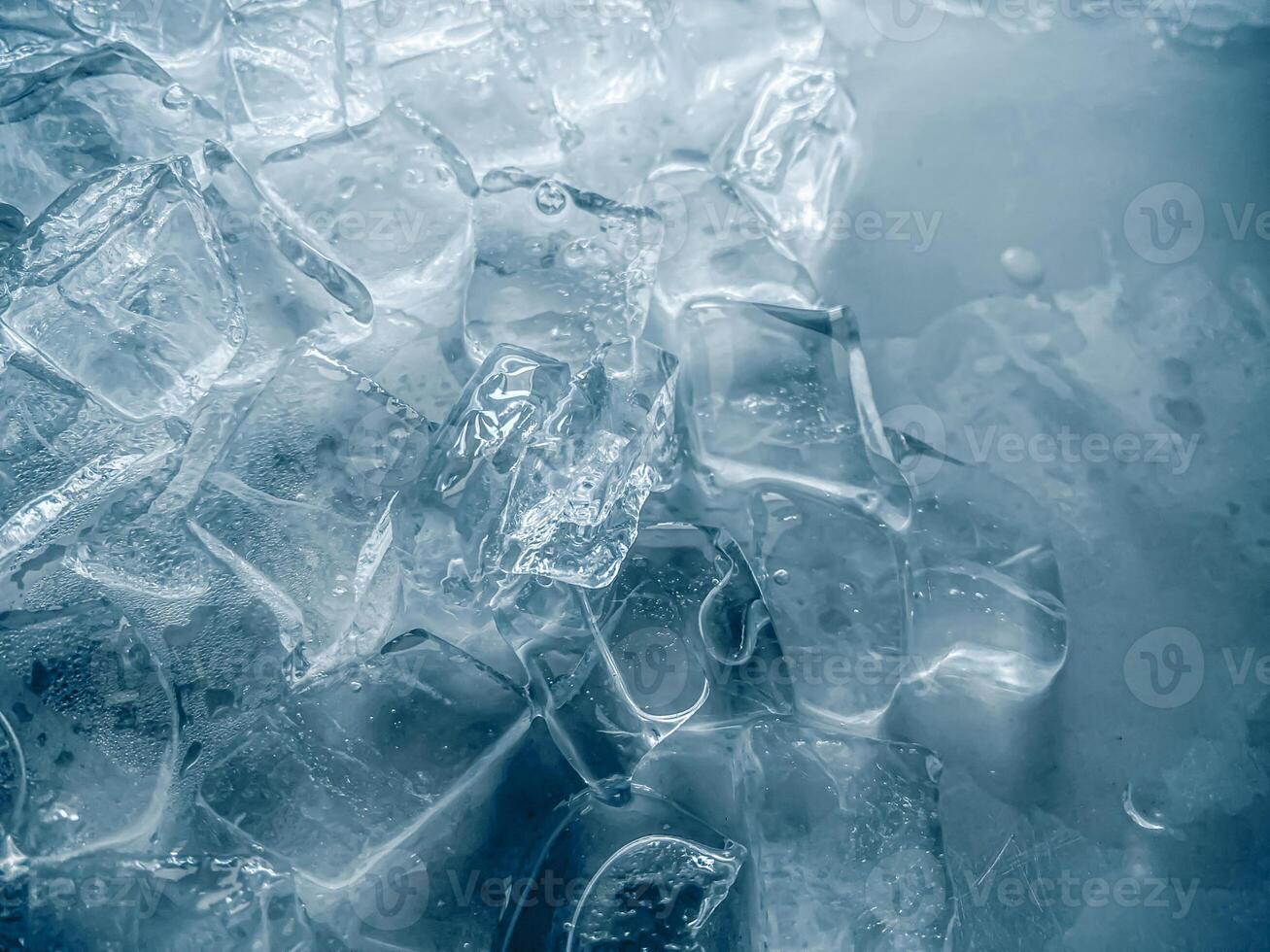 icecubes background,icecubes texture,icecubes wallpaper,ice helps to feel refreshed and cool water from the icecubes helps the water refresh your life and feel good.ice drinks for refreshment business photo