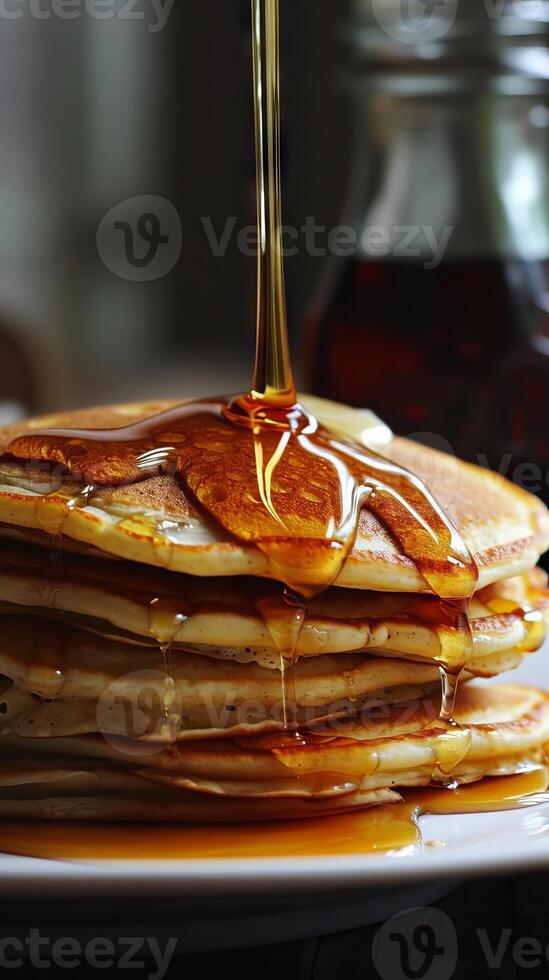 National Pancake Day stacks and syrup drizzles photo