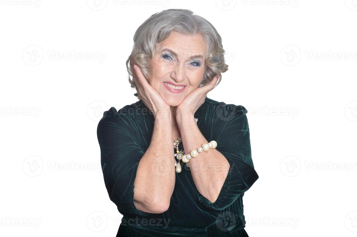 portrait of happy senior woman posing photo