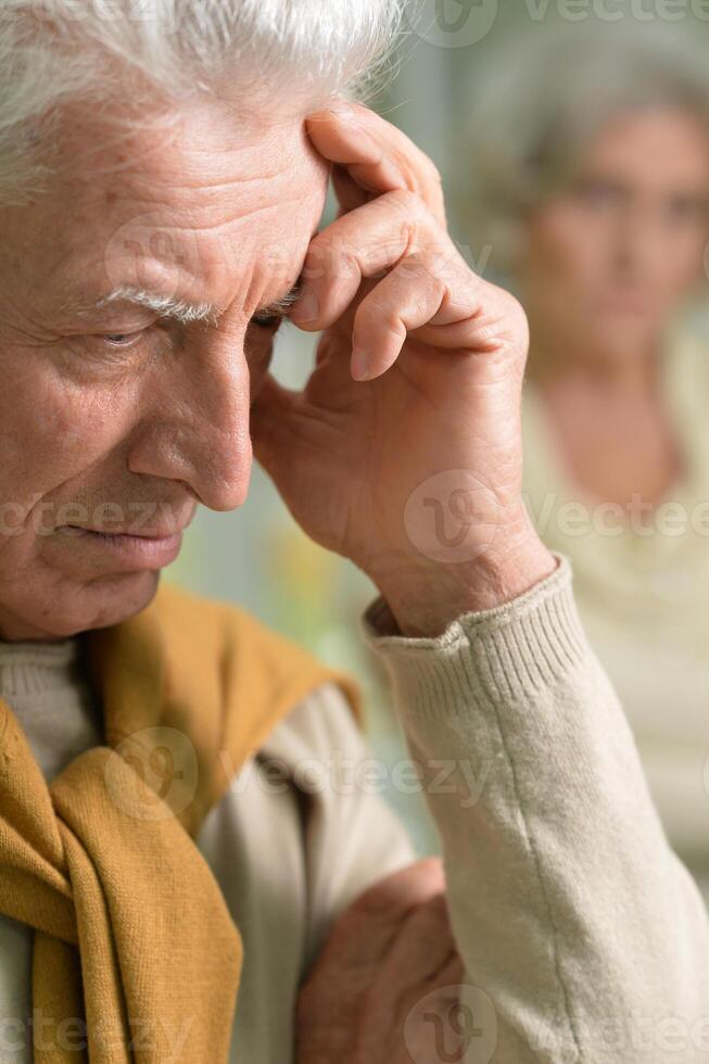 Portrait of a thoughtful senior man close-up photo