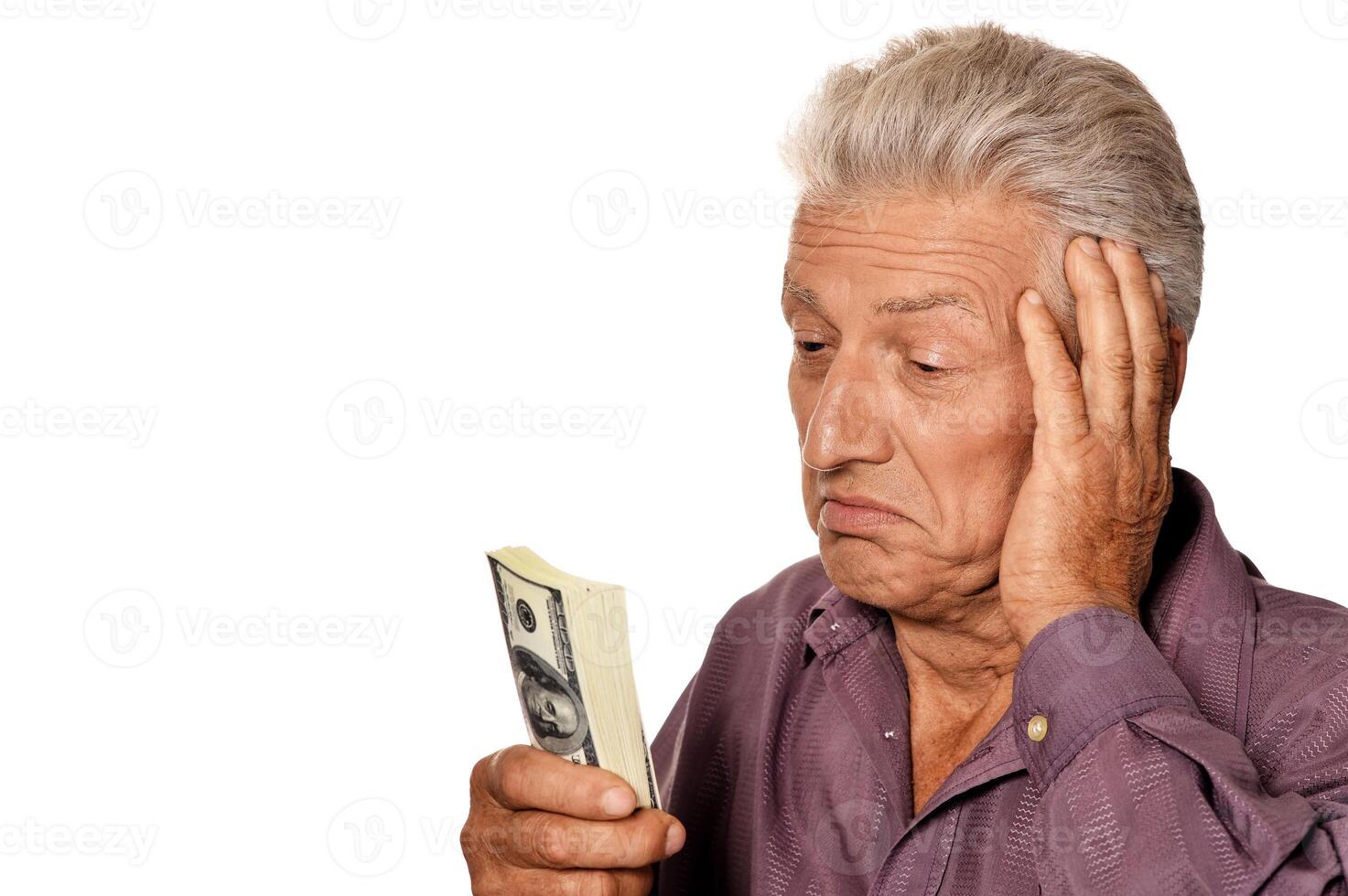 Senior man with dollars photo