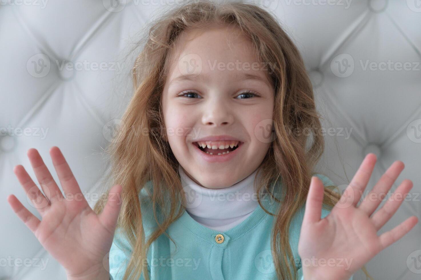 Close up portrait of cute girl smiling photo