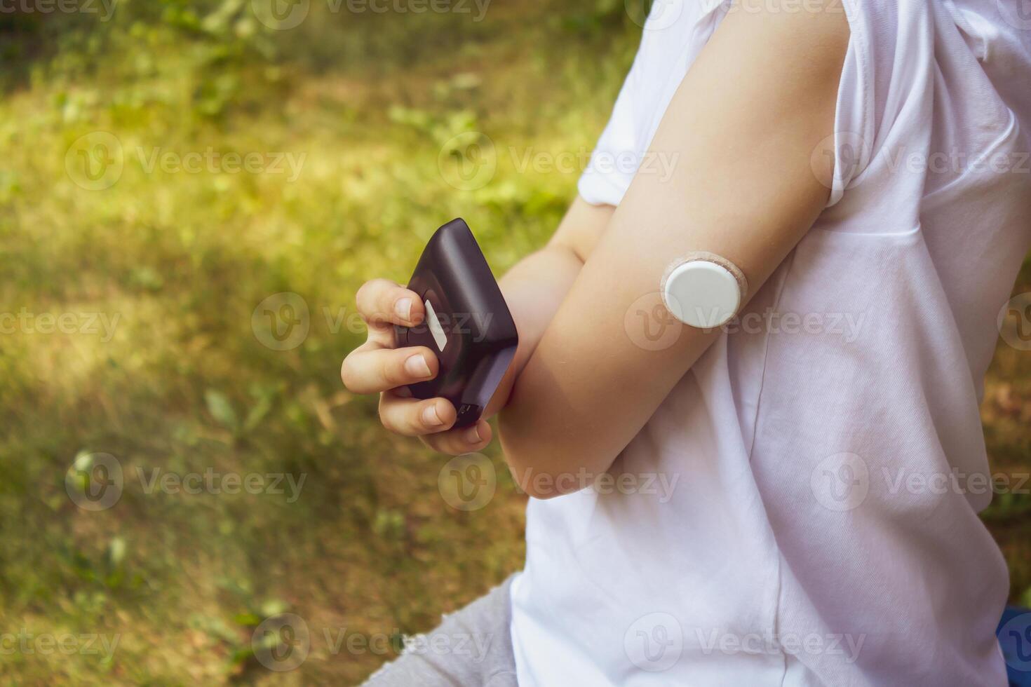 Concept life of a child with diabetes and glycemic control photo