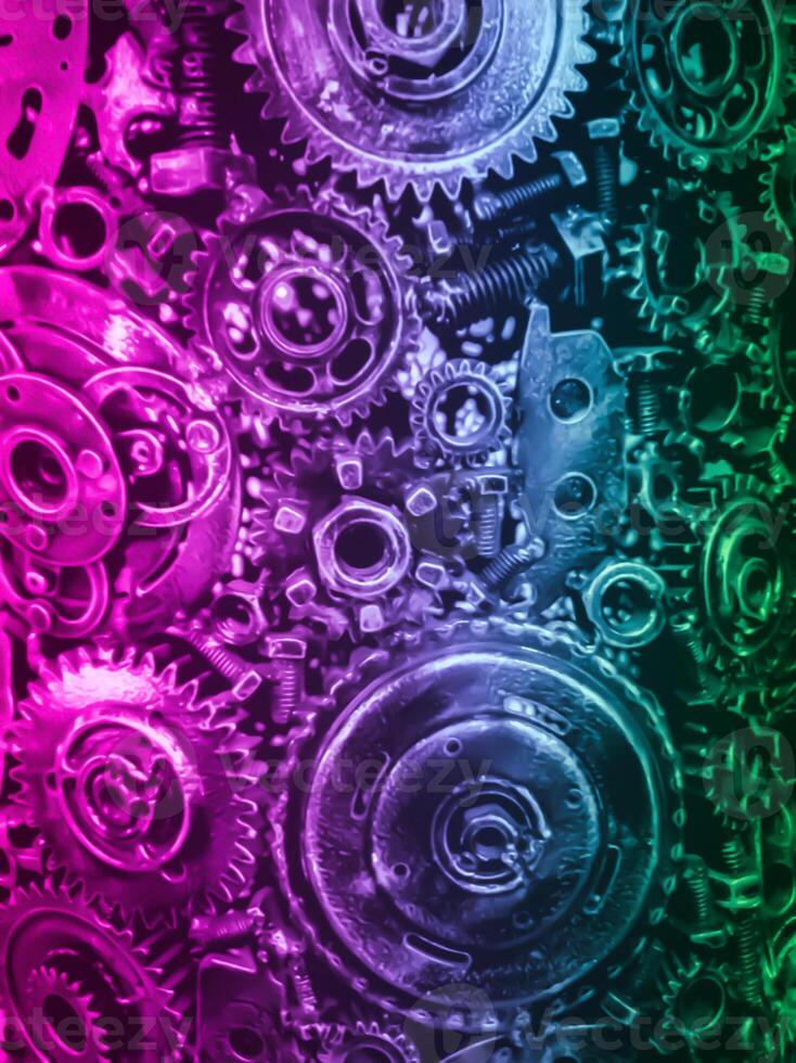 Neon, industrial background with different kind of metal gears and mechanisms photo
