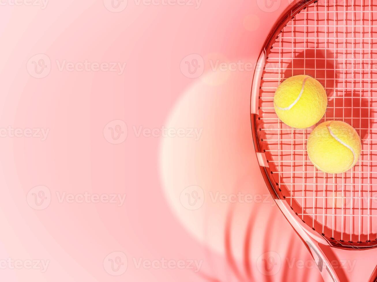 Yellow tennis balls and racket on a pink, evening background with copy space photo