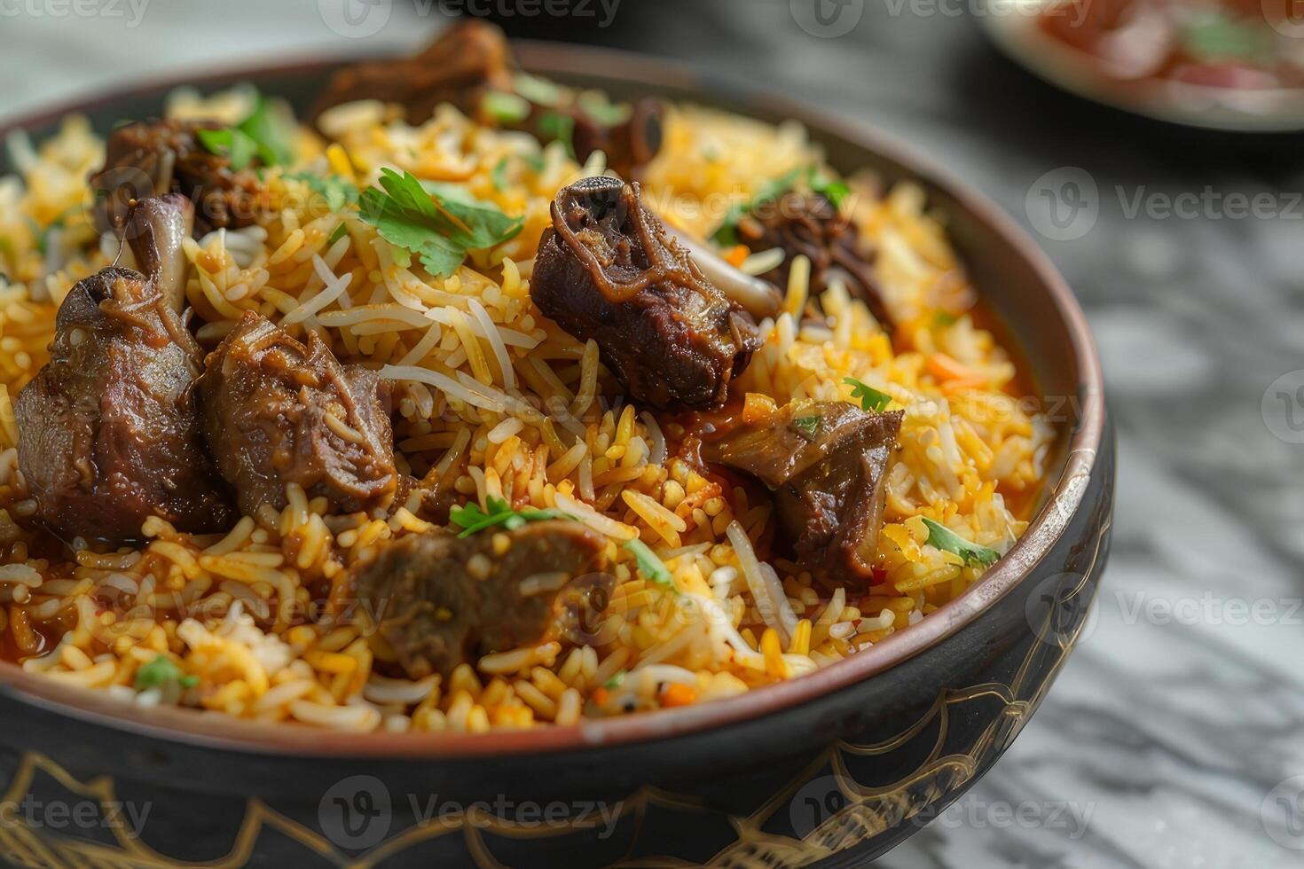 A plate of mandi rice or mandhi on a marble countertop photo