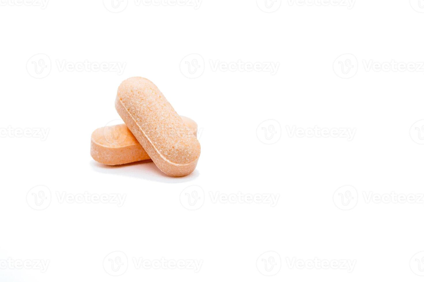 Pills isolated on white background. Close up. Copy space. photo