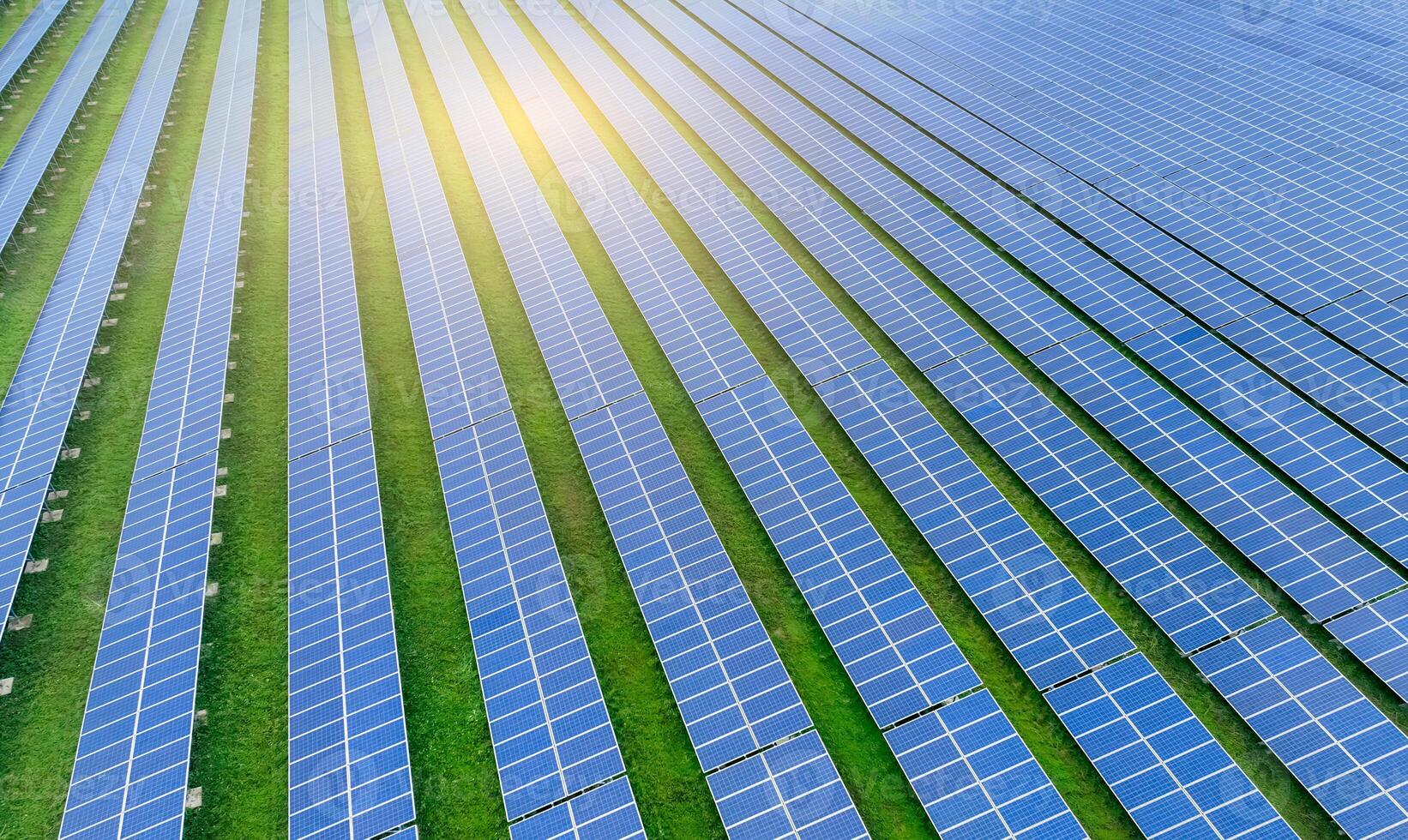 Solar farm and sun light. Solar power for green energy. Sustainable renewable energy. Photovoltaic power station or solar park. Solar panel installation and maintenance concept. Energy sustainability. photo
