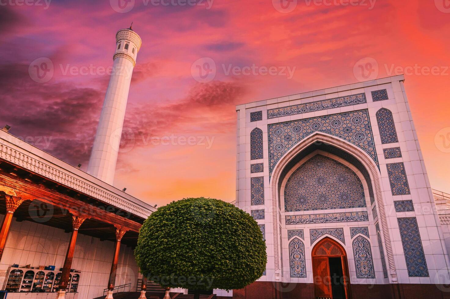 new Islamic Masjid Minor Mosque in Tashkent in Uzbekistan on background of dramatic red sunset sky photo