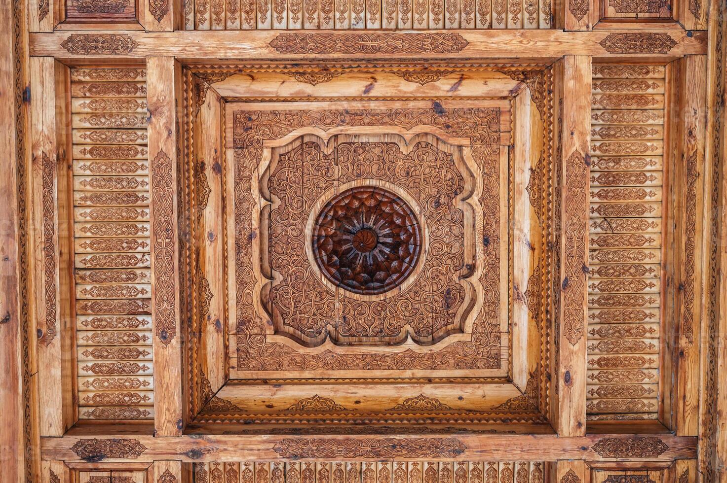 old carved wooden ceiling with oriental uzbec pattern ornament in Museum of Victims of Political Repression in Tashkent in Uzbekistan photo