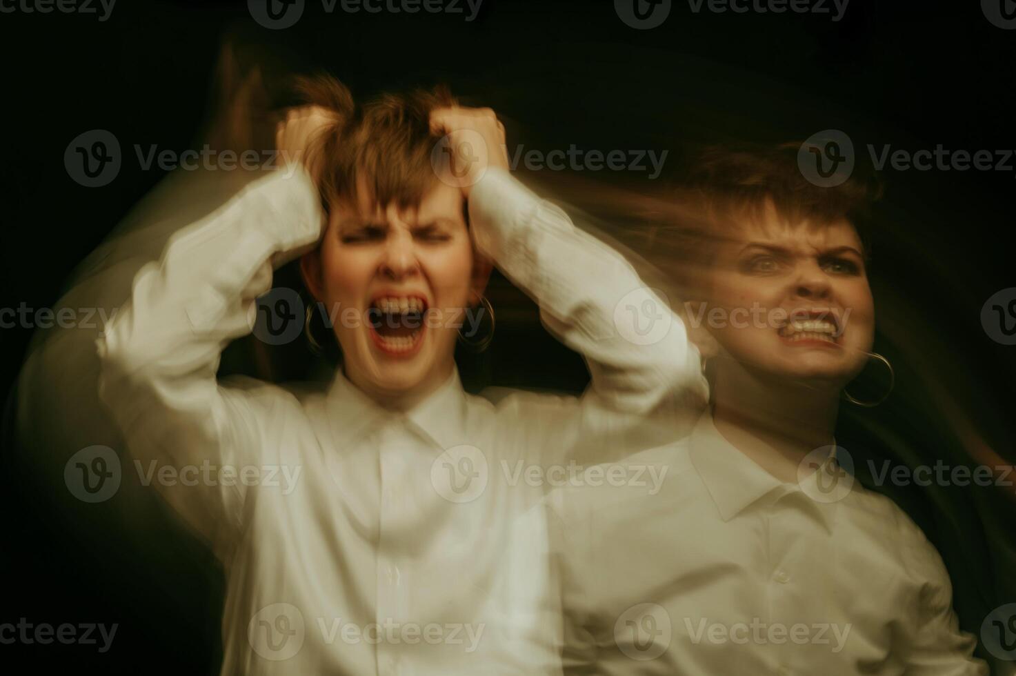 woman is psychopath with schizophrenia and mental disorders. Abstract blurry portrait of a girl with psychosis and panic attacks photo