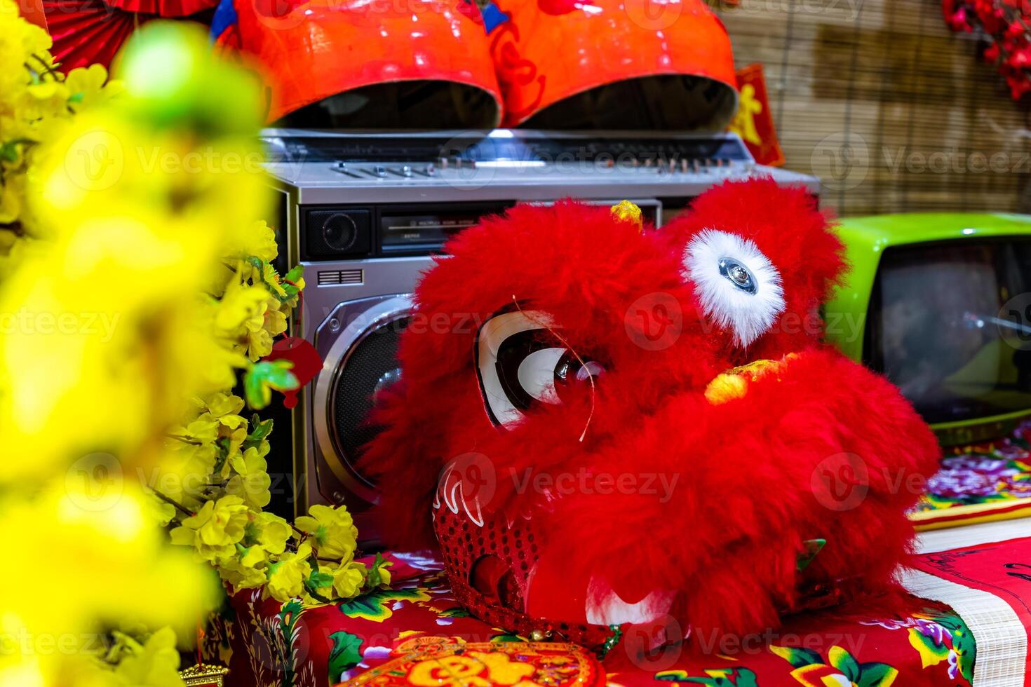 A head of Chinese Lion dance in the Chinese new year festival. Lion and dragon dance during Chinese New Year celebration. Group of people perform a traditional lion dance. photo