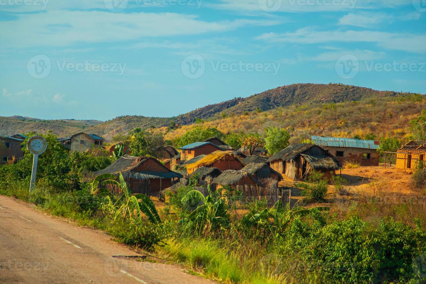 Road through village in central Madagascar photo