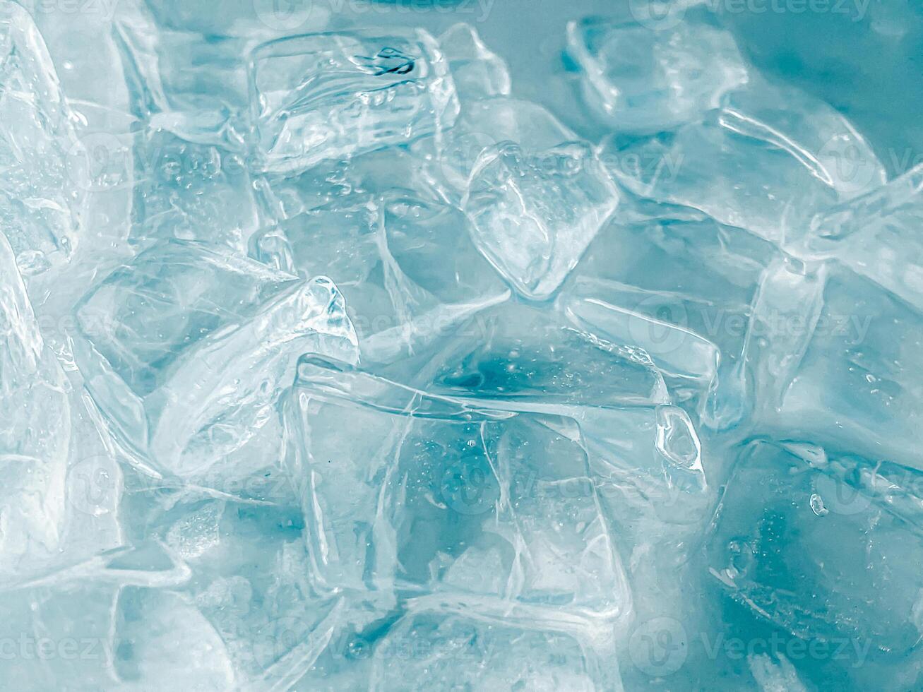 icecubes background,icecubes texture,icecubes wallpaper,ice helps to feel refreshed and cool water from the icecubes helps the water refresh your life and feel good.ice drinks for refreshment business photo