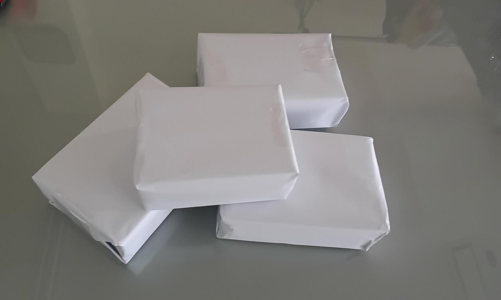 White cardboard boxes are stacked photo