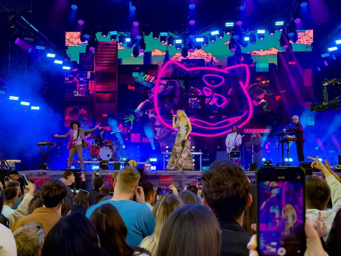 Captivating live performance by Moya Mishel at the STEREOLETO Festival in Saint Petersburg, Russia, on June 15, 2024. The stage was alive with vibrant lights, energetic music, and an enthusiastic crowd. photo