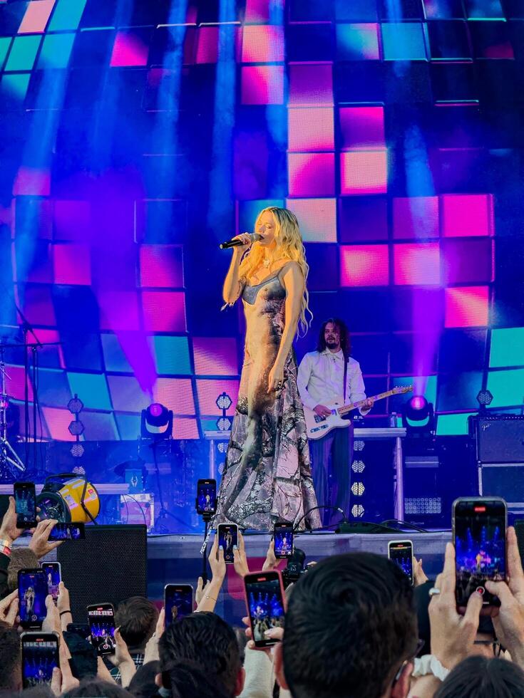 Captivating live performance by Moya Mishel at the STEREOLETO Festival in Saint Petersburg, Russia, on June 15, 2024. The stage was alive with vibrant lights, energetic music, and an enthusiastic crowd. photo