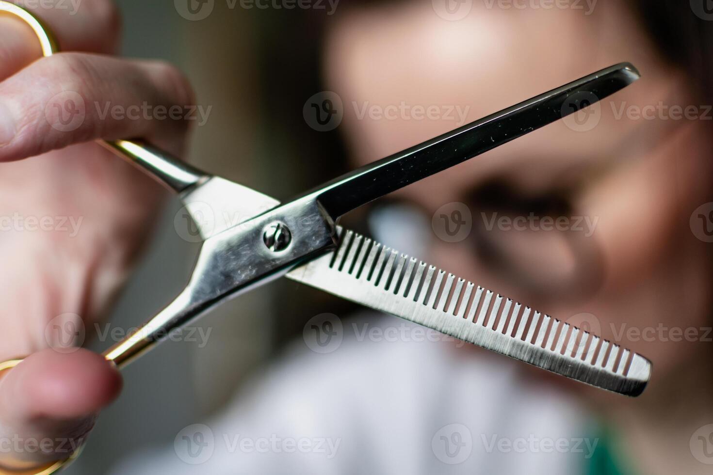 Woman with scissor to cut hair photo