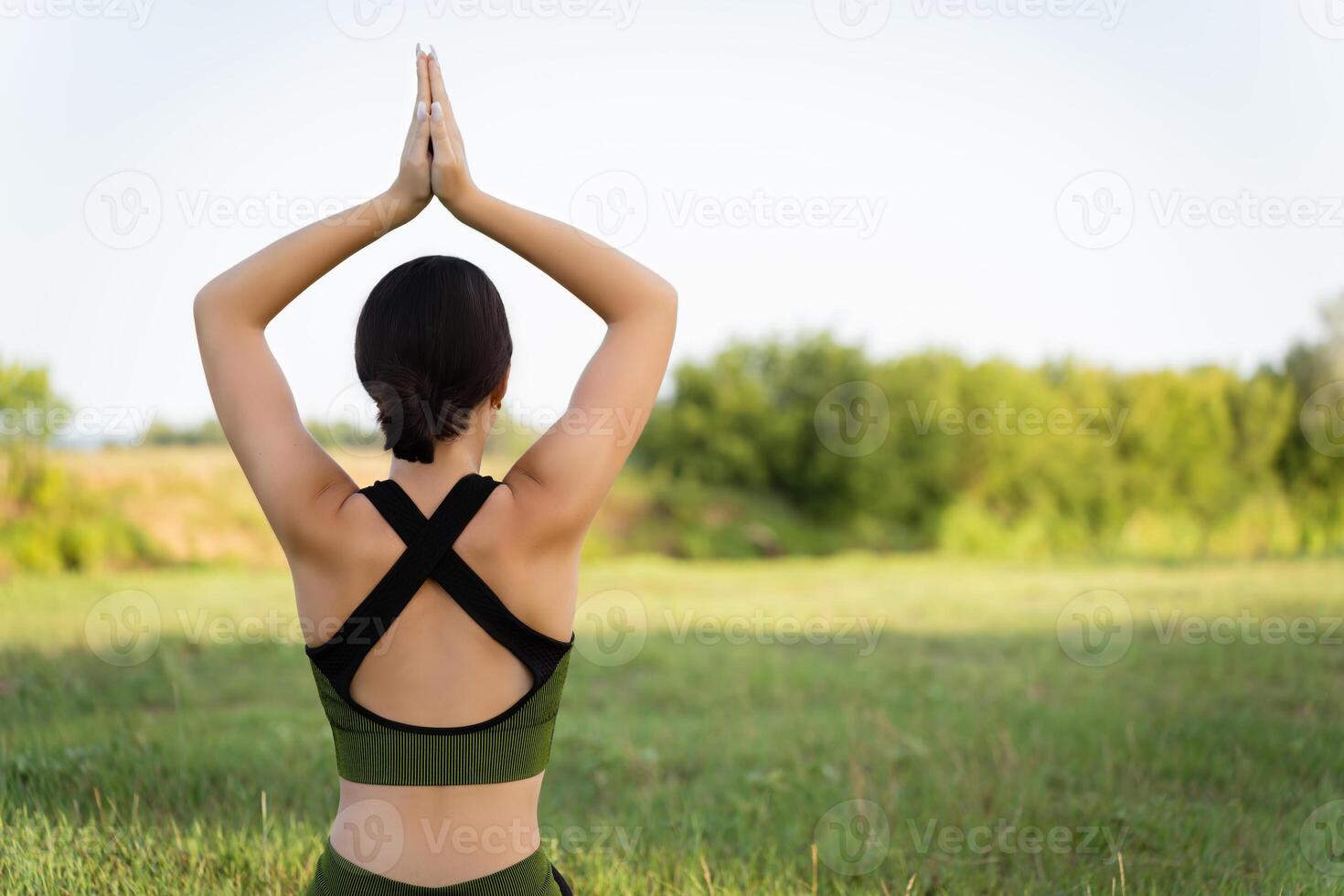 The skill and professionalism of a yoga instructor. a girl practices yoga in a natural location immersed in the world of yoga and nature photo