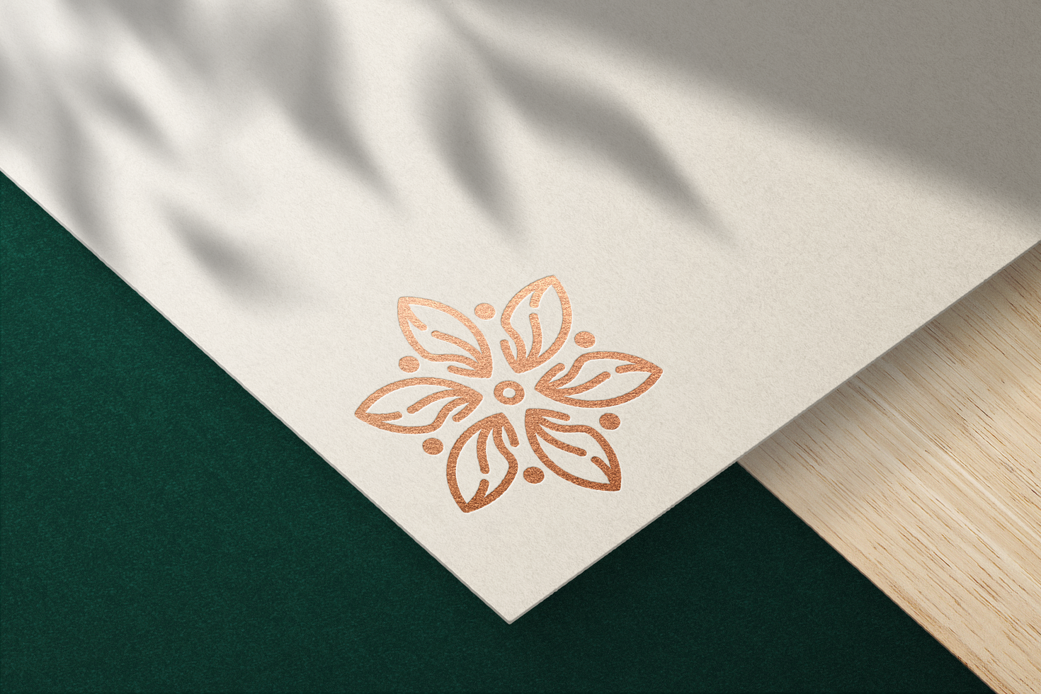Debossed Logo Mockup on Cream Paper with Bronze Foil Effect Premium psd