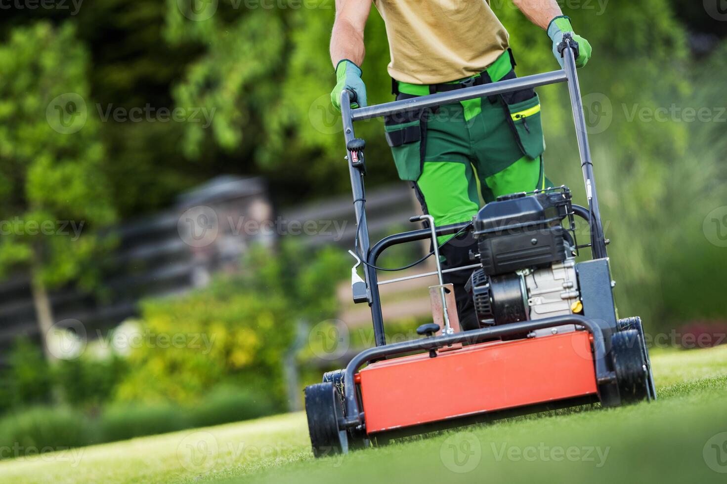 Landscaper Operating Gasoline Powered Aerator photo