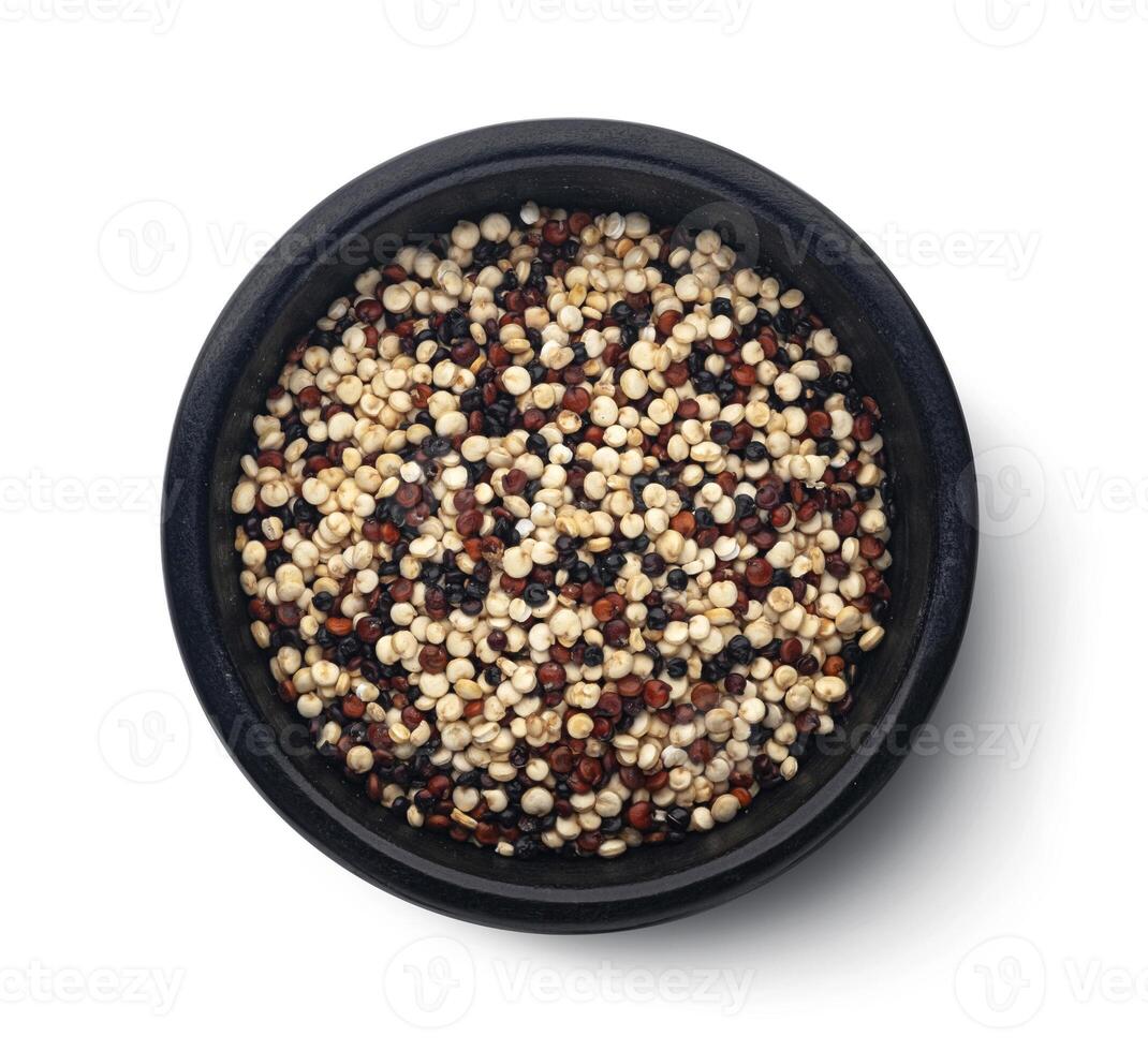 Raw quinoa seeds mix isolated on white background, top view photo
