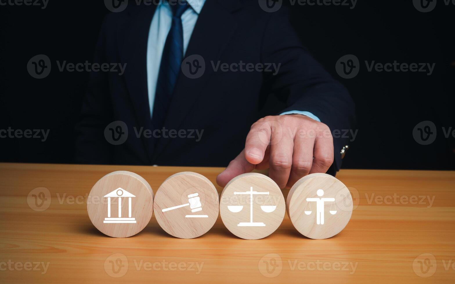 Businessman pointing his finger at virtual global law icons on for business legal advice, Labor law, Attorney at law, Legal advice business concept, Lawyer icon, Lawyer man, Lawyer background. photo