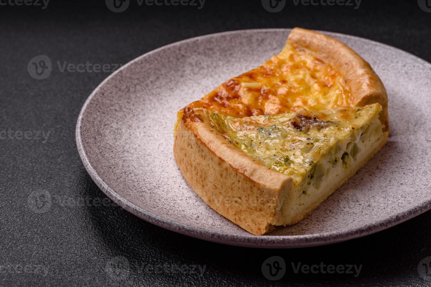 Delicious quiche with broccoli, chicken or salmon and cheese photo