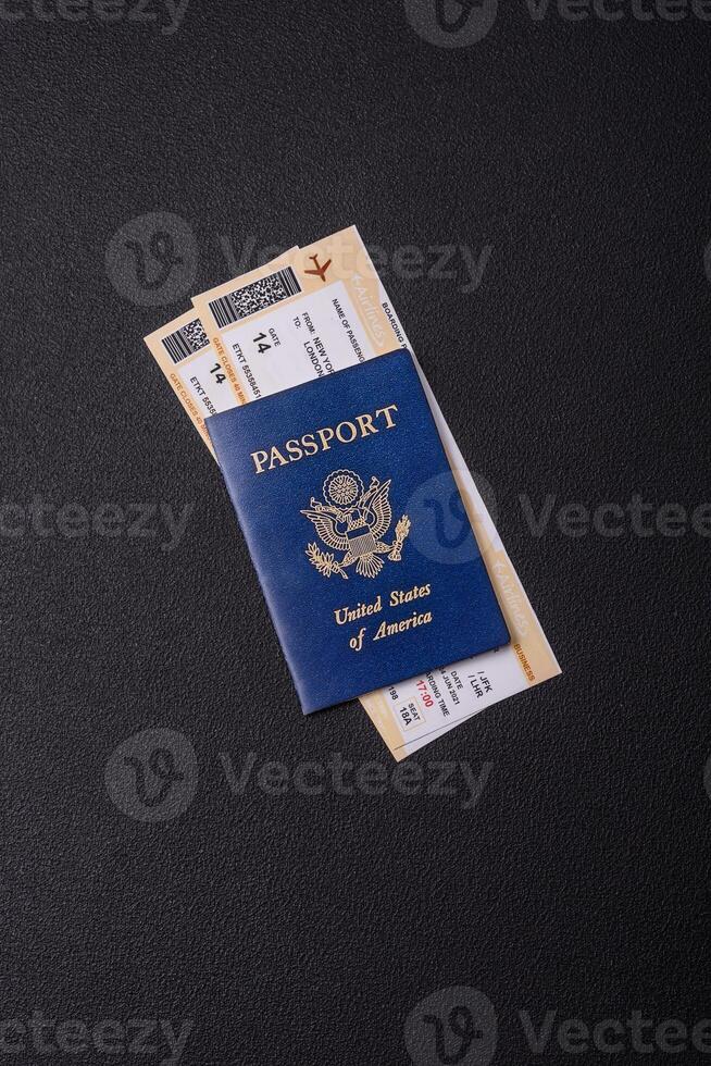 United States of America passport, airline tickets and money photo