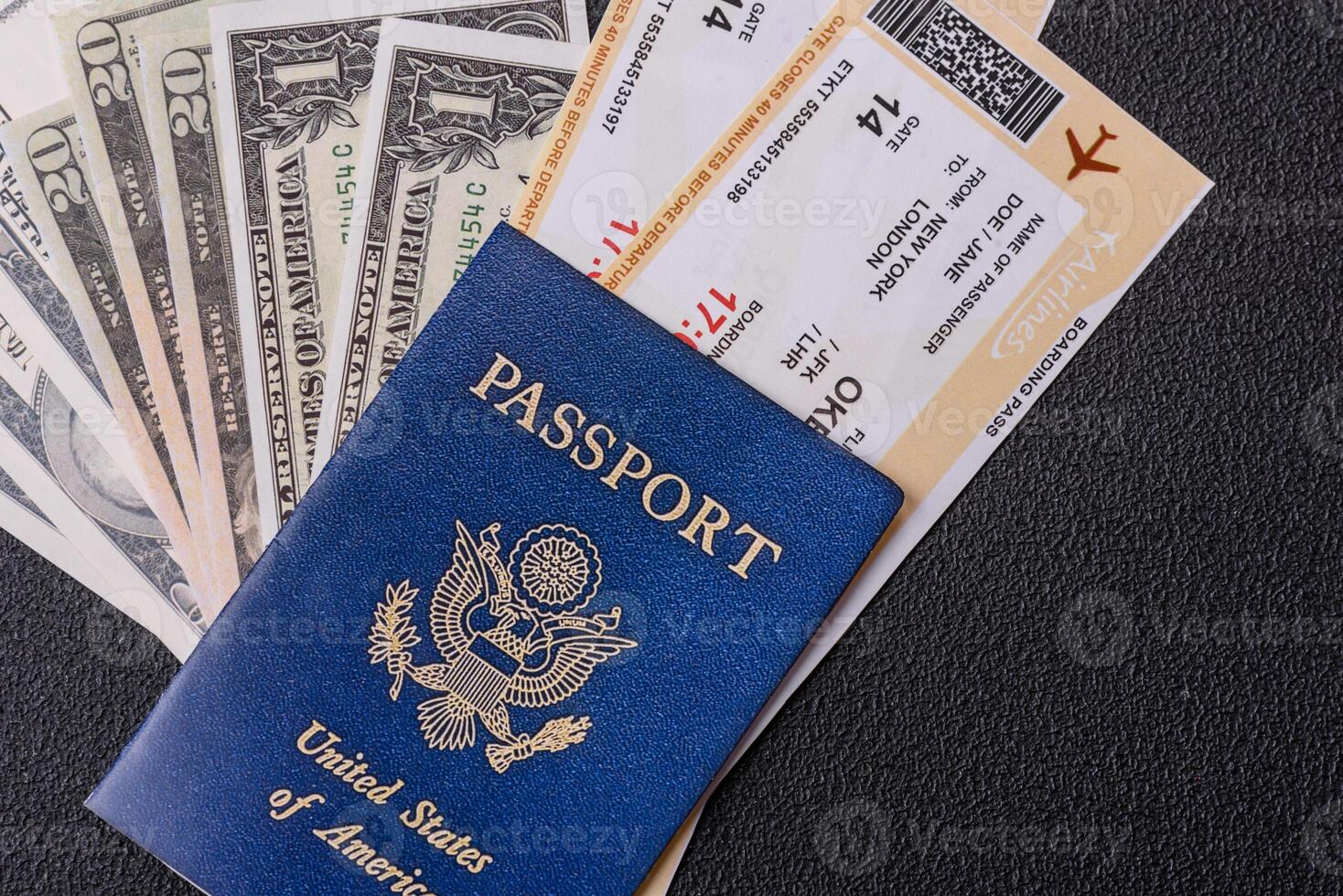 United States of America passport, airline tickets and money photo