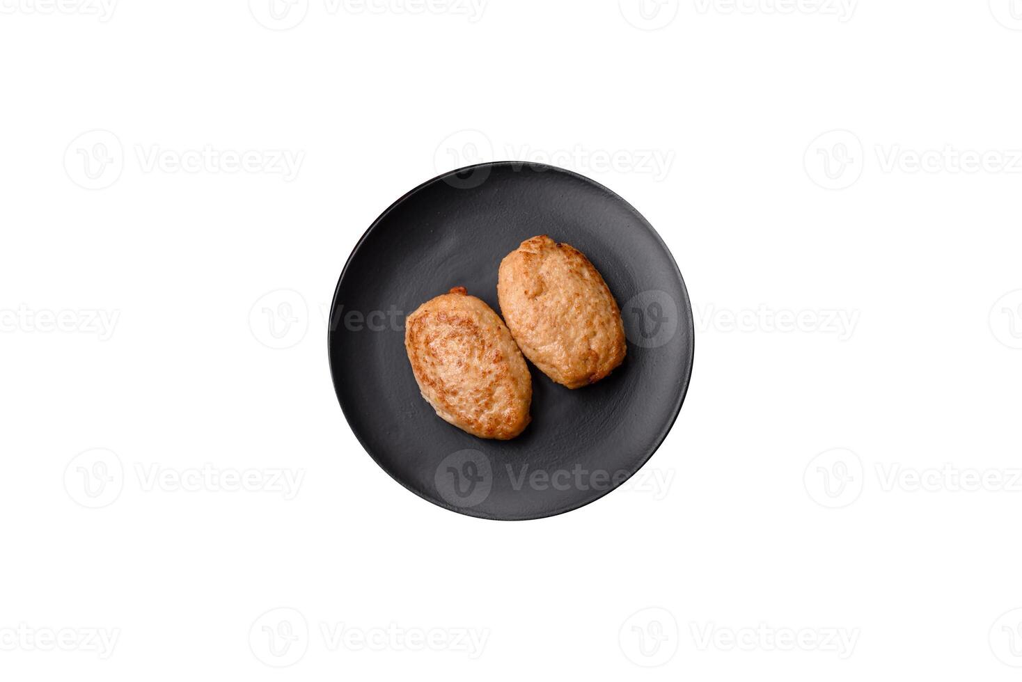 Delicious fresh fried minced cutlets with spices and herbs photo